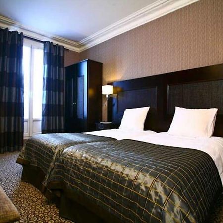 Hotel Convention Montparnasse Paris Zimmer foto